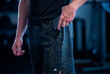 Load image into Gallery viewer, Men&#39;s gym shorts with a crocodile pattern made by Apex Fitness Apparel

